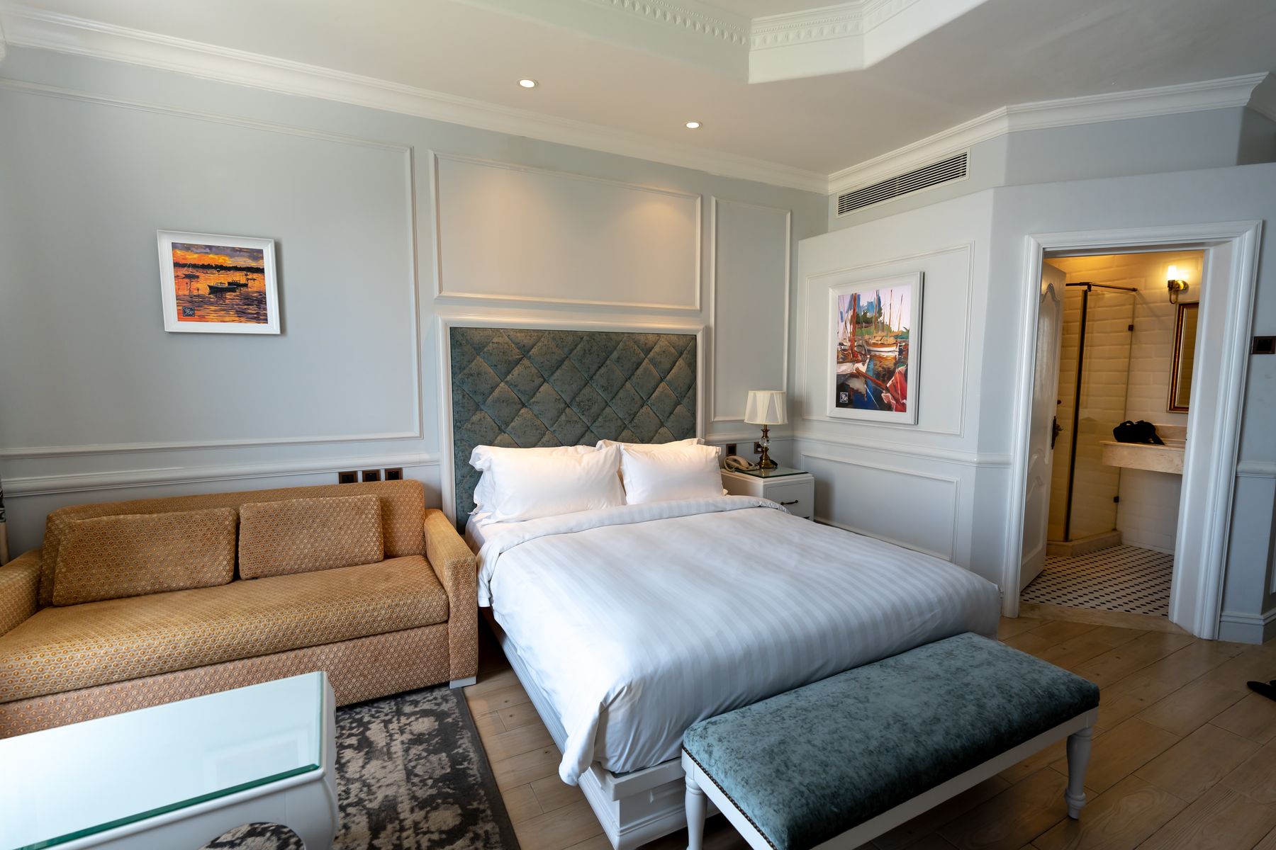 Upholstered bed and sofa in a furnished room